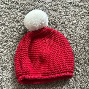 Red and white beanie.